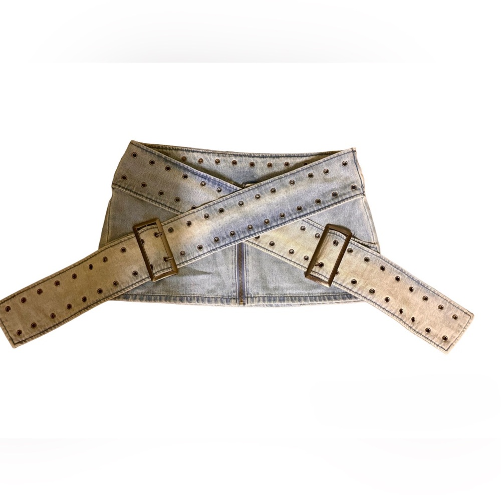 Micro mini light wash denim skirt with a criss cross belt design!
